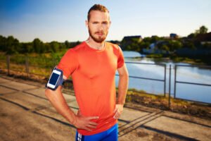 Runner with proper upright running form outdoors in Indianapolis